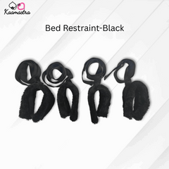 Black bed restraint set on a white background with 'Kaamastra' branding.