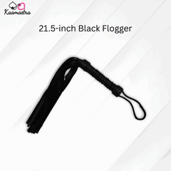 Black flogger with a handle on a white background, branded 'Kaamastra'.