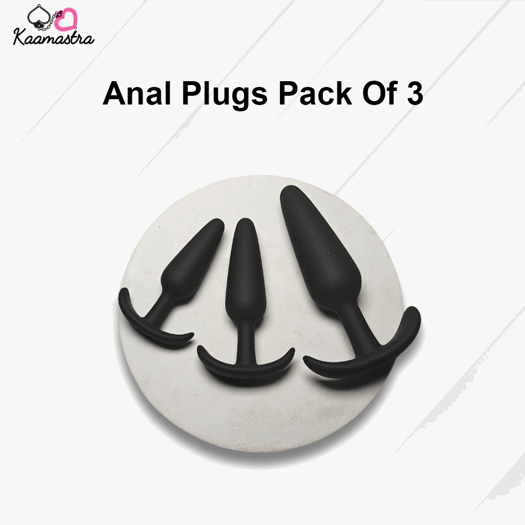 Pack of three black anal plugs on a white background with 'Kaamastra' branding.