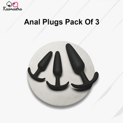 Pack of three black anal plugs on a white background with 'Kaamastra' branding.