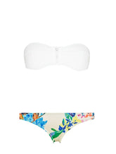 A two-piece bikini with a white strapless top and multicolored floral print on the bottom.