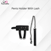 Black penis holder with chain and lash on a white background, branded 'Kaamastra'.