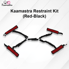 Kaamastra Restraint Kit with red and black straps on a white background