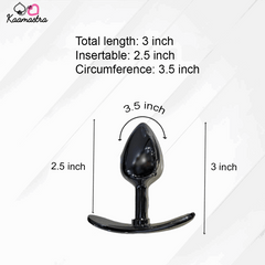 Black anal plug with measurements on a white background