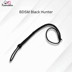 Black leather whip labeled 'BDSM Black Hunter' on a white background with 'Kaamastra' branding.