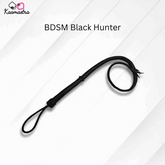 Black leather whip labeled 'BDSM Black Hunter' on a white background with 'Kaamastra' branding.