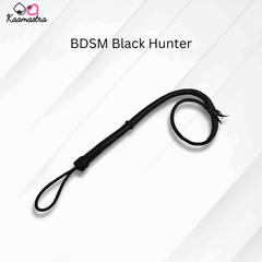 Black leather whip labeled 'BDSM Black Hunter' on a white background with 'Kaamastra' branding.