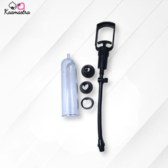 Pump kit with black pump, white container, and various parts on a white background