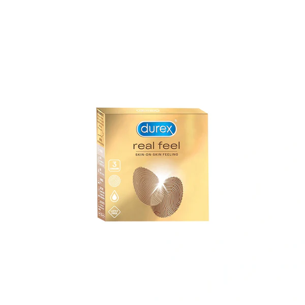 A box of Durex Real Feel Condoms with a gold and white color scheme featuring the product's benefits.