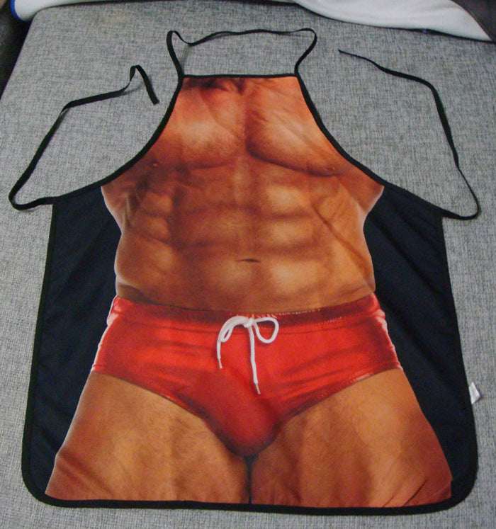Apron featuring a printed design of a shirtless man wearing a red thong.