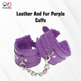 A pair of purple faux leather handcuffs with fur lining, connected by a metal chain.