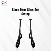 The image shows a black door slam sex swing with adjustable straps and stirrups, designed to be used over a door for vertical intimate activities.