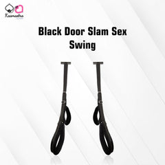 The image shows a black door slam sex swing with adjustable straps and stirrups, designed to be used over a door for vertical intimate activities.