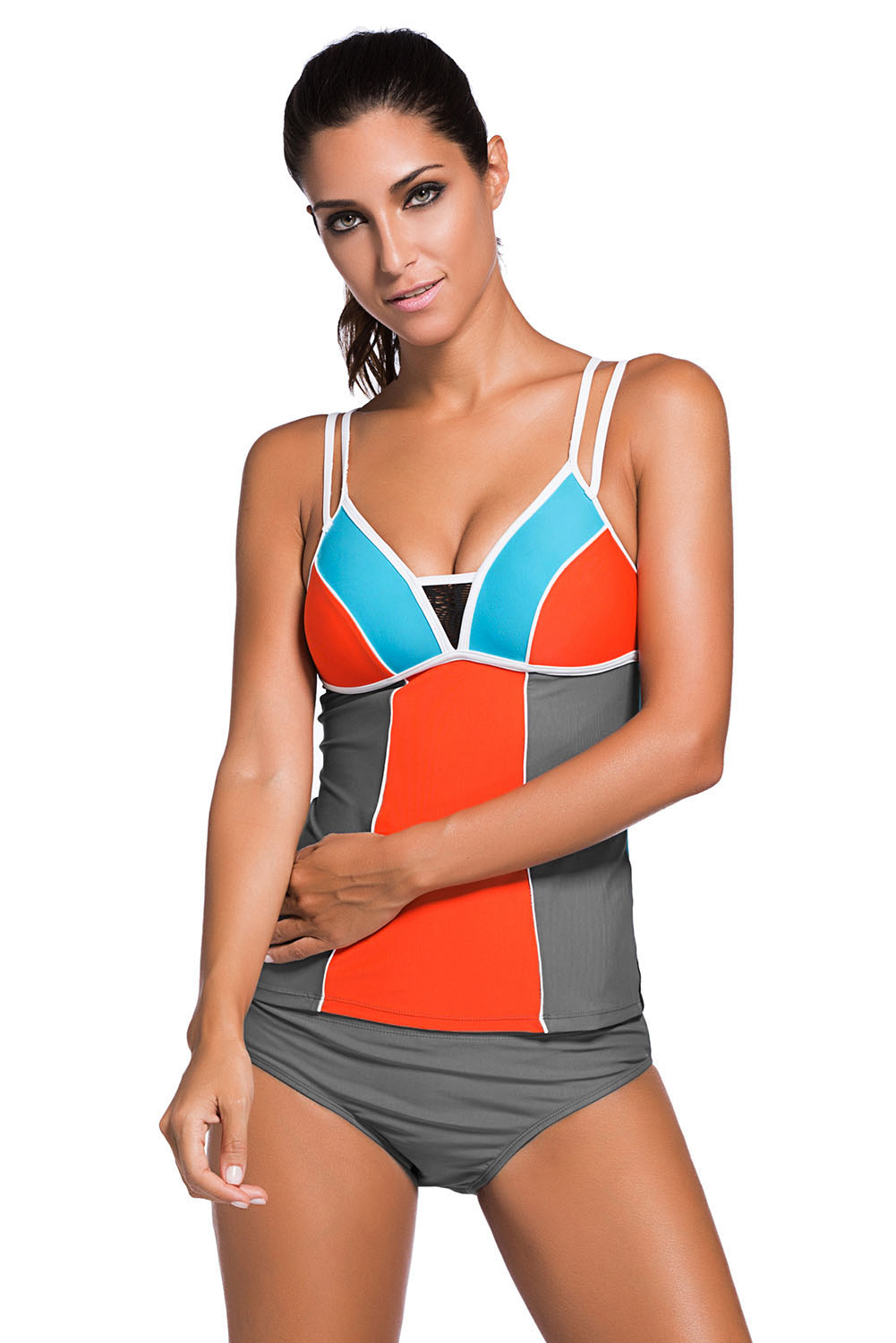 A model wearing a color block tankini swimsuit with lace detailing and grey briefs.
