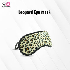 A black and white leopard print eye mask with elastic straps.