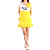 A woman wearing a Kaamastra yellow casual dress with a V-neck design. The dress is primarily yellow with a white top that has the name 'Max' printed on it.