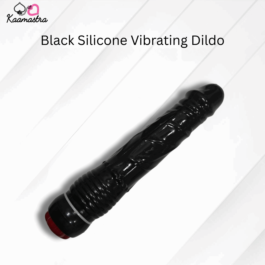 Black silicone vibrating dildo on a white background with 'Kaamastra' branding.