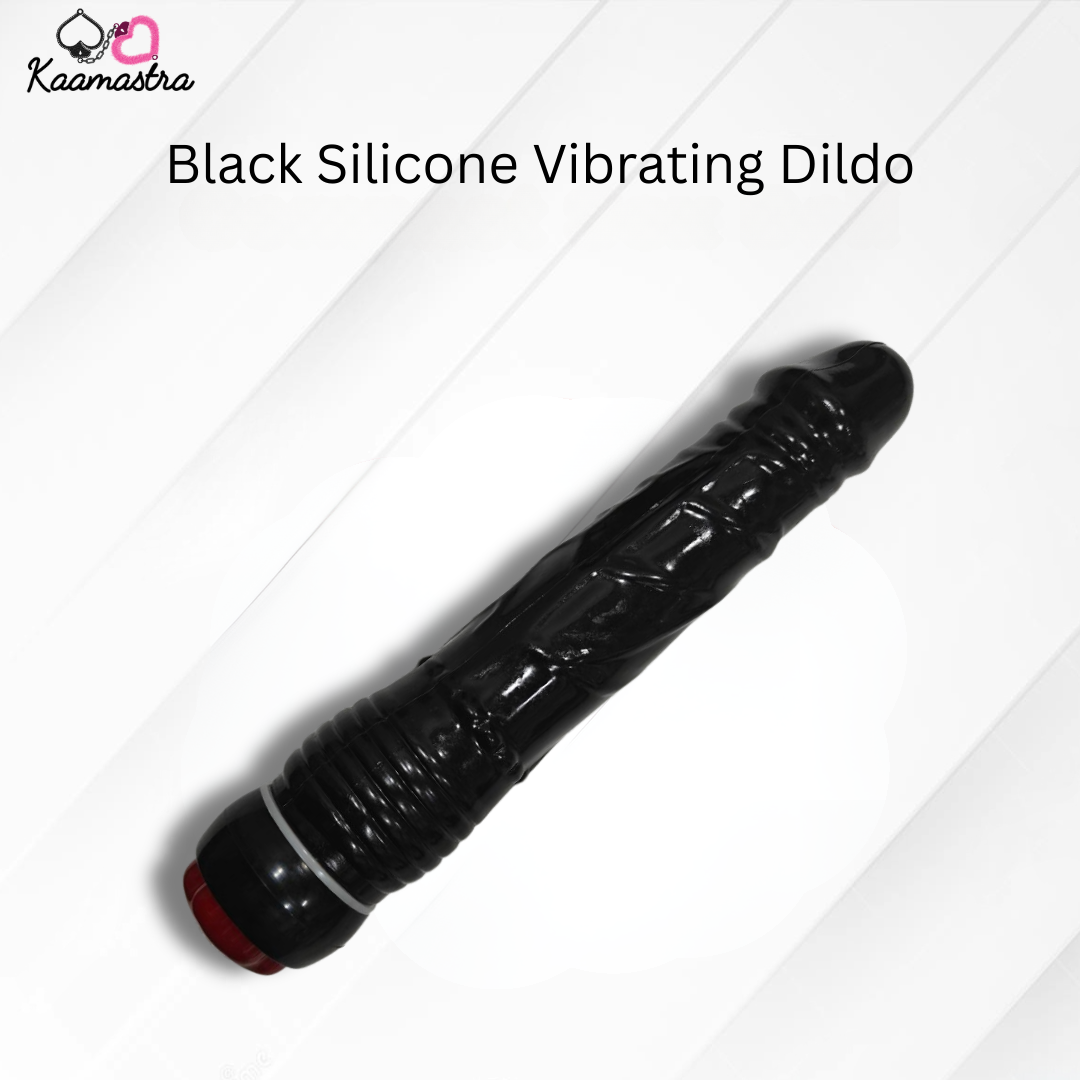 Black silicone vibrating dildo on a white background with 'Kaamastra' branding.