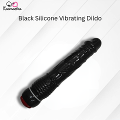 Black silicone vibrating dildo on a white background with 'Kaamastra' branding.