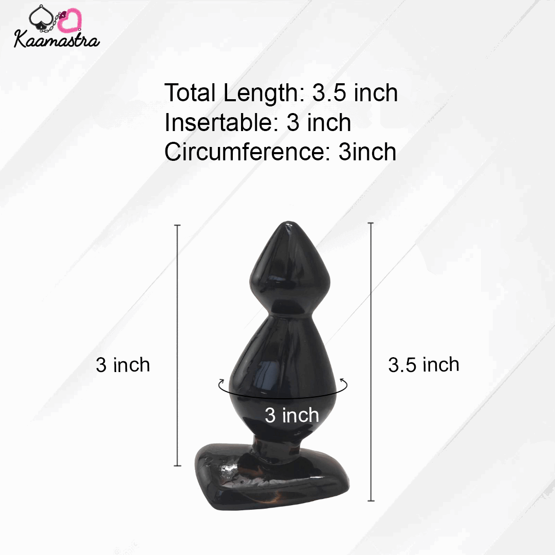 Black silicone butt plug with measurements on a white background