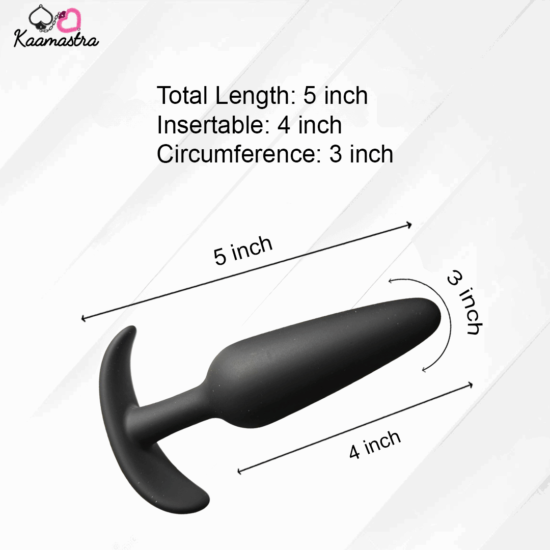 Black butt plug with measurements on a white background, featuring the brand 'Kaamastra'.