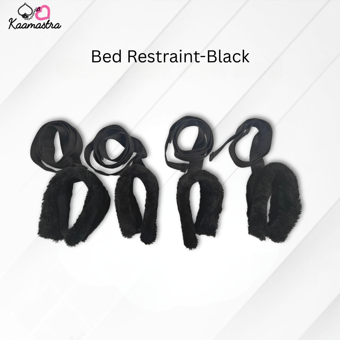 Black bed restraint set on a white background with 'Kaamastra' branding.