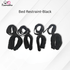Black bed restraint set on a white background with 'Kaamastra' branding.