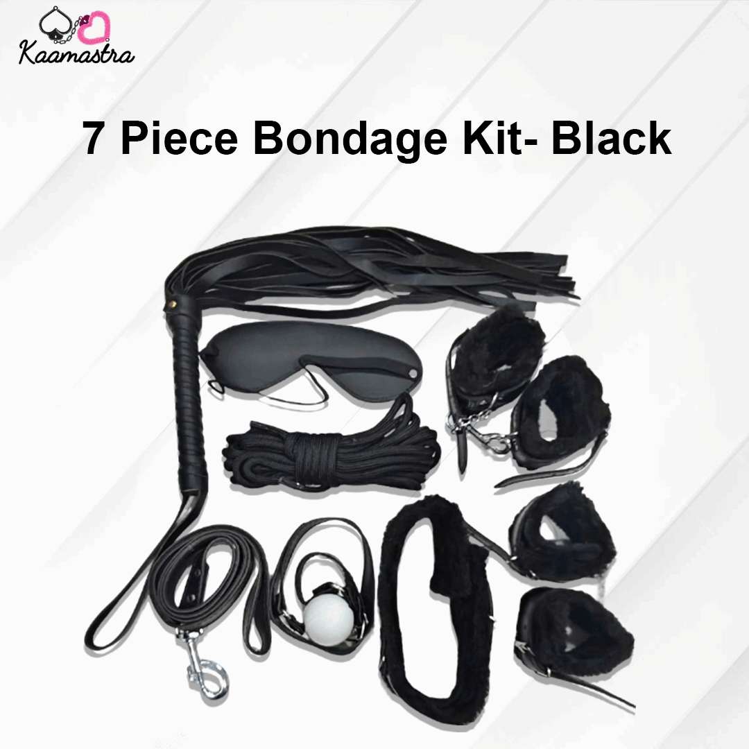 Kaamastra 7-piece black bondage kit including restraints, whip, and collar for secure play