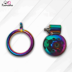 Multicolored metal ring and round object on a white background with 'Kaamastra' branding.