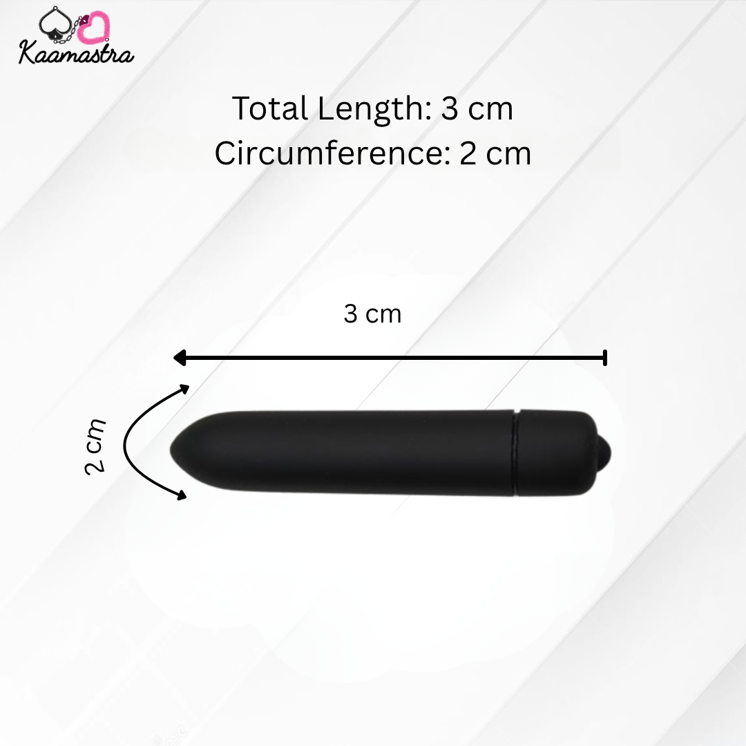 Black cylindrical object with measurements on a white background