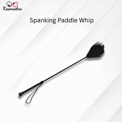 Spanking paddle whip on a white background with 'Kaamastra' branding.