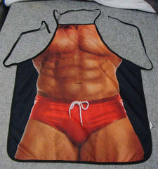 Apron featuring a printed design of a shirtless man wearing a red thong.