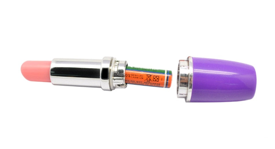 Close-up of mini black lipstick vibrator with cap removed showing ON/OFF control