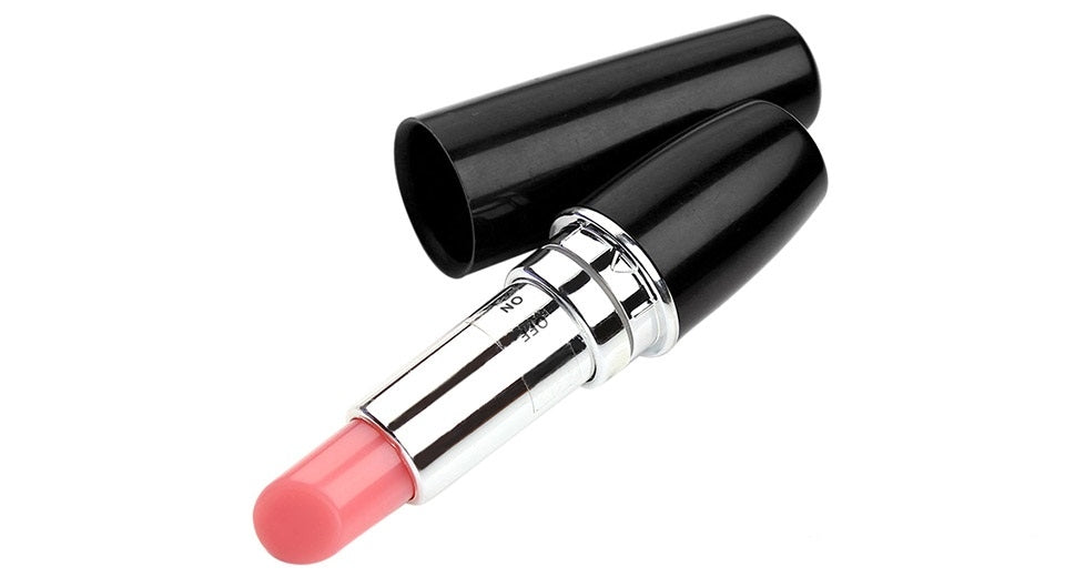 Mini lipstick vibrator showing open cap and battery slot with AAA battery